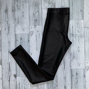 Express black pleather leggings with elastic waist band. New with tags. Sz Small